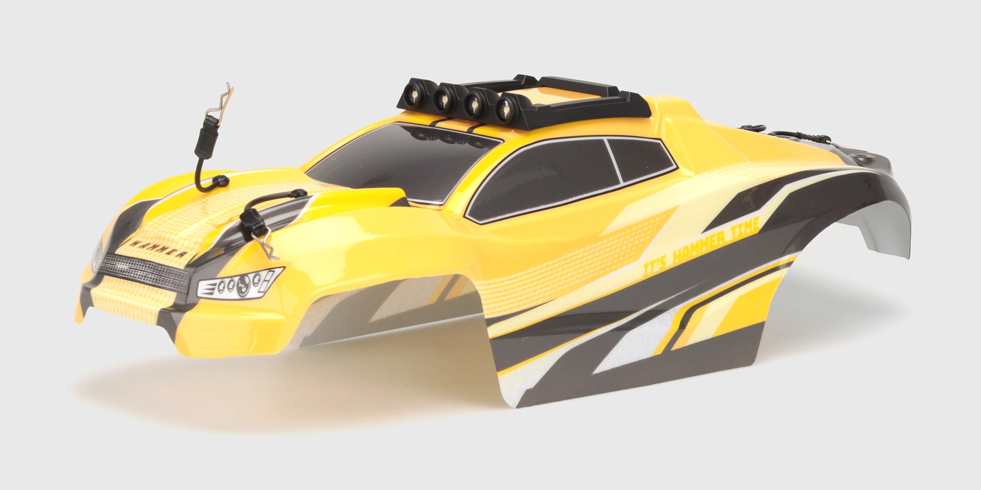 Sort Hammer Body karrosseri i holdbar plast til fjernstyret monster truck set fra siden.