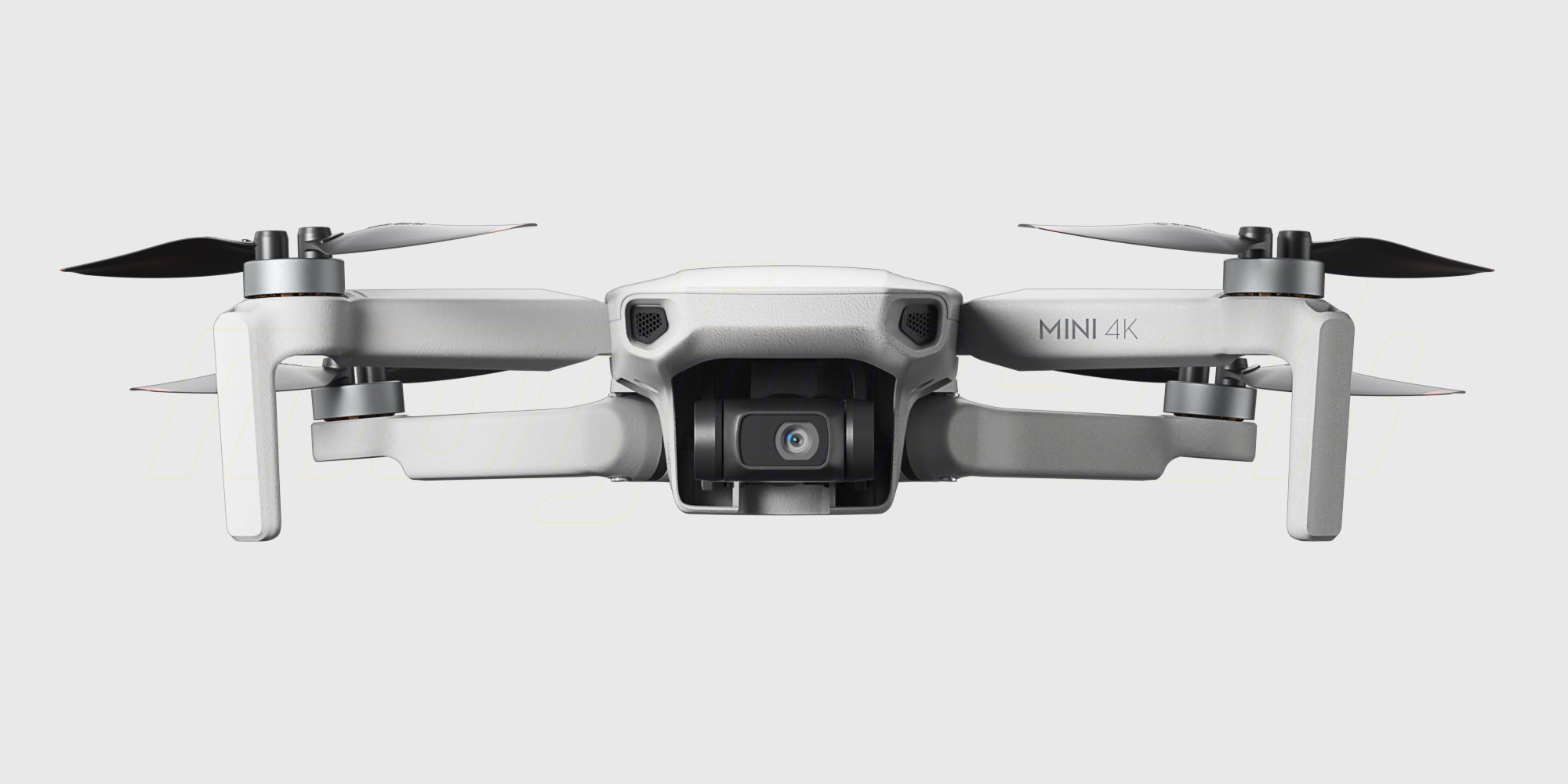 DJI Mini 4K Fly More Combo med drone, fjernbetjening og ekstra batterier vist på hvid baggrund.