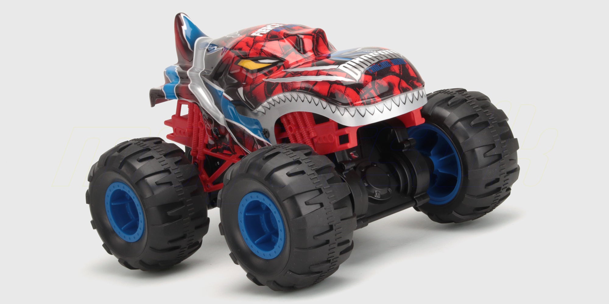 Blå Flash4 MAX fjernstyret buggy med firehjulstræk og grove offroad-dæk klar til kørsel i terræn.