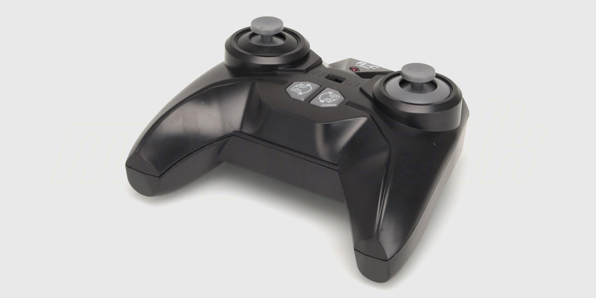 Sort fjernstyring til Flash4 MAX med ergonomisk greb og kontrolknapper til præcis styring af fjernstyret bil.