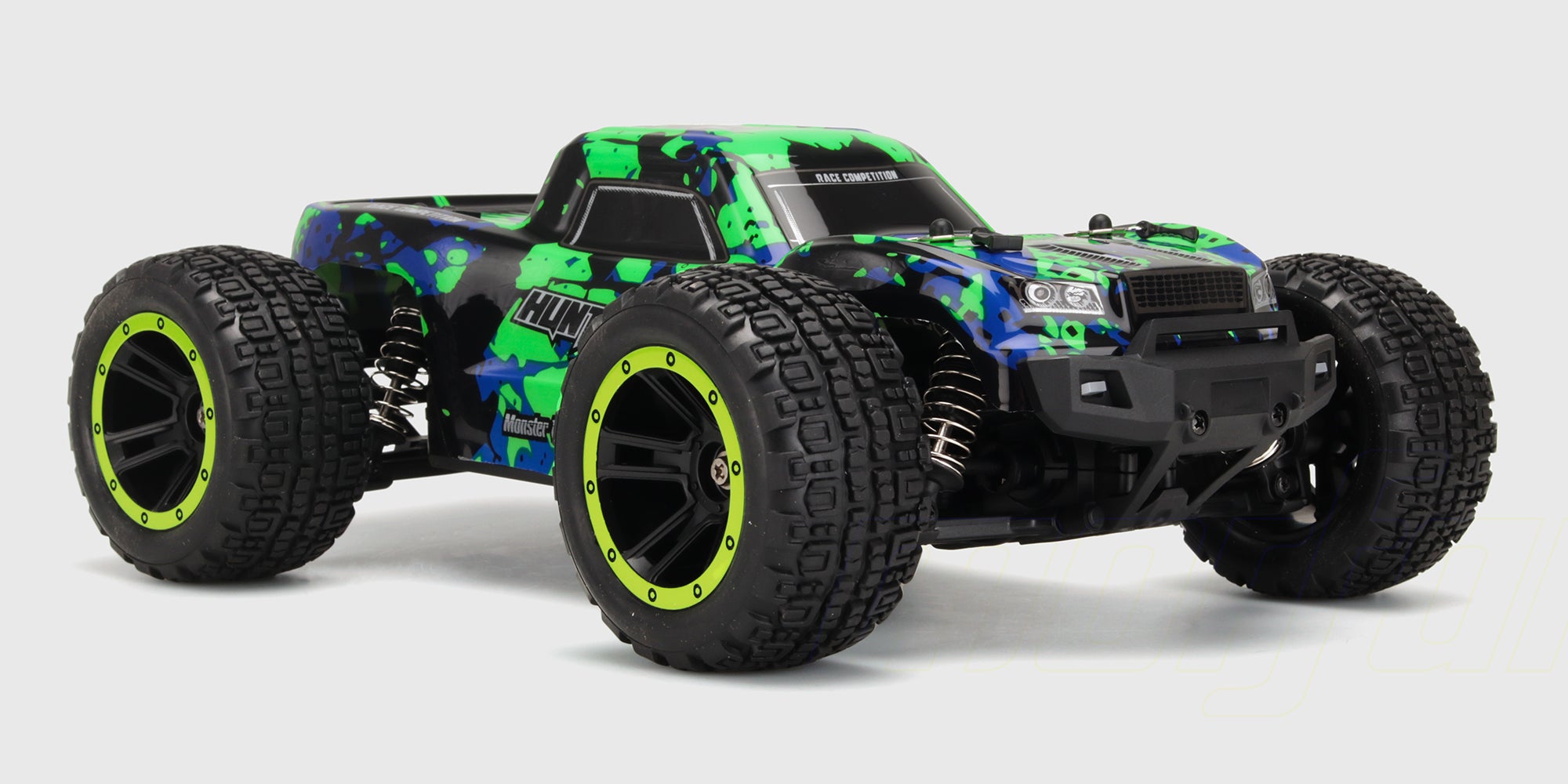 Grøn Hunter MT10 fjernstyret monster truck set forfra på en hvid baggrund.