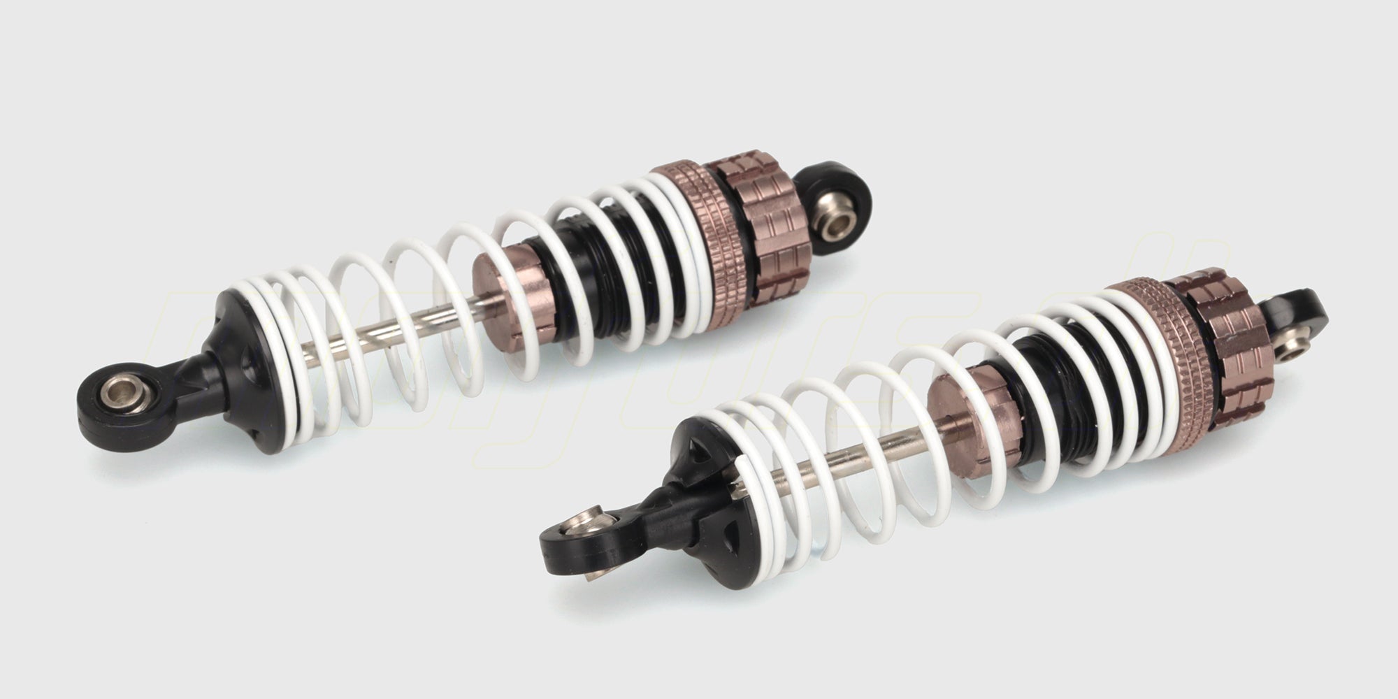 To sorte bagstøddæmpere i metal med sølvfarvede fjedre til Hammer fjernstyret bil på hvid baggrund.