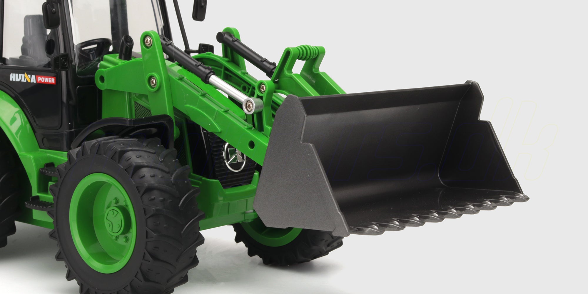 Gul Huina 1579 fjernstyret rendegraver med fuldt funktionel frontskovl og gravearm.