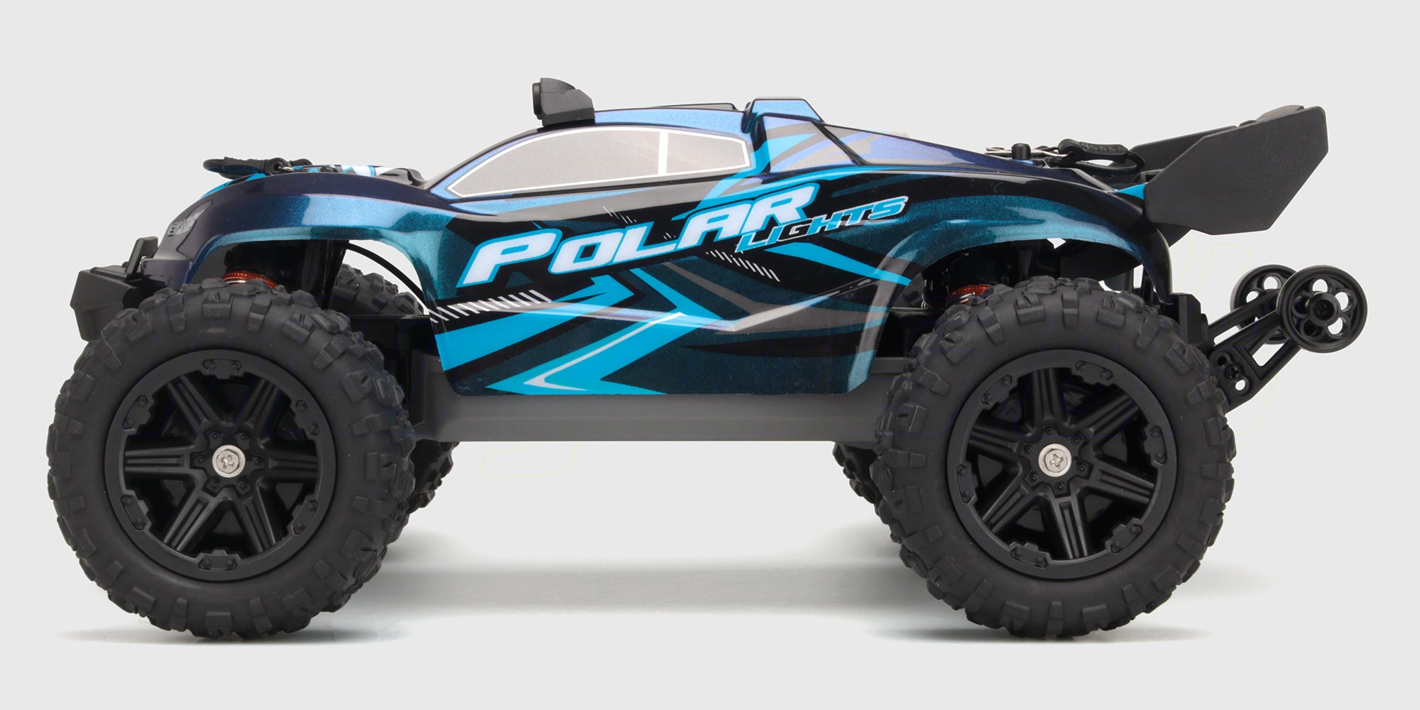 Hurricane XL fjernstyret monstertruck med grønt karrosseri og store offroad-hjul vist på hvid baggrund.