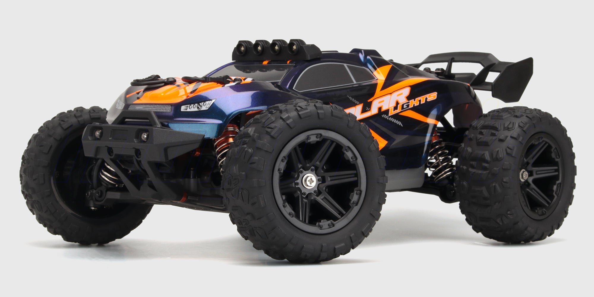 Hurricane XL fjernstyret offroad-bil med blåt karrosseri og store dæk til kørsel på grus og asfalt.