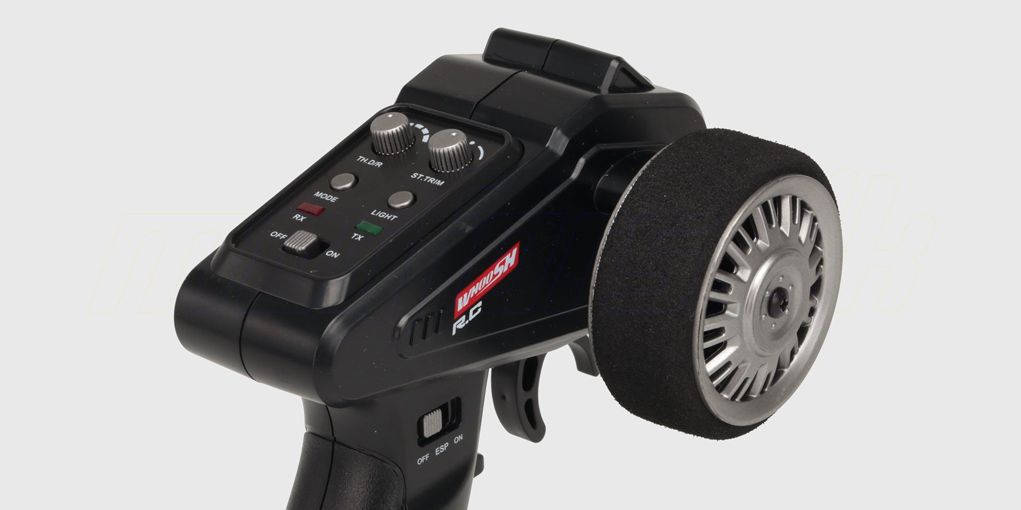 Grå Legend Drift Elite fjernstyret bil med detaljeret interiør og spoiler set fra siden på en hvid baggrund.