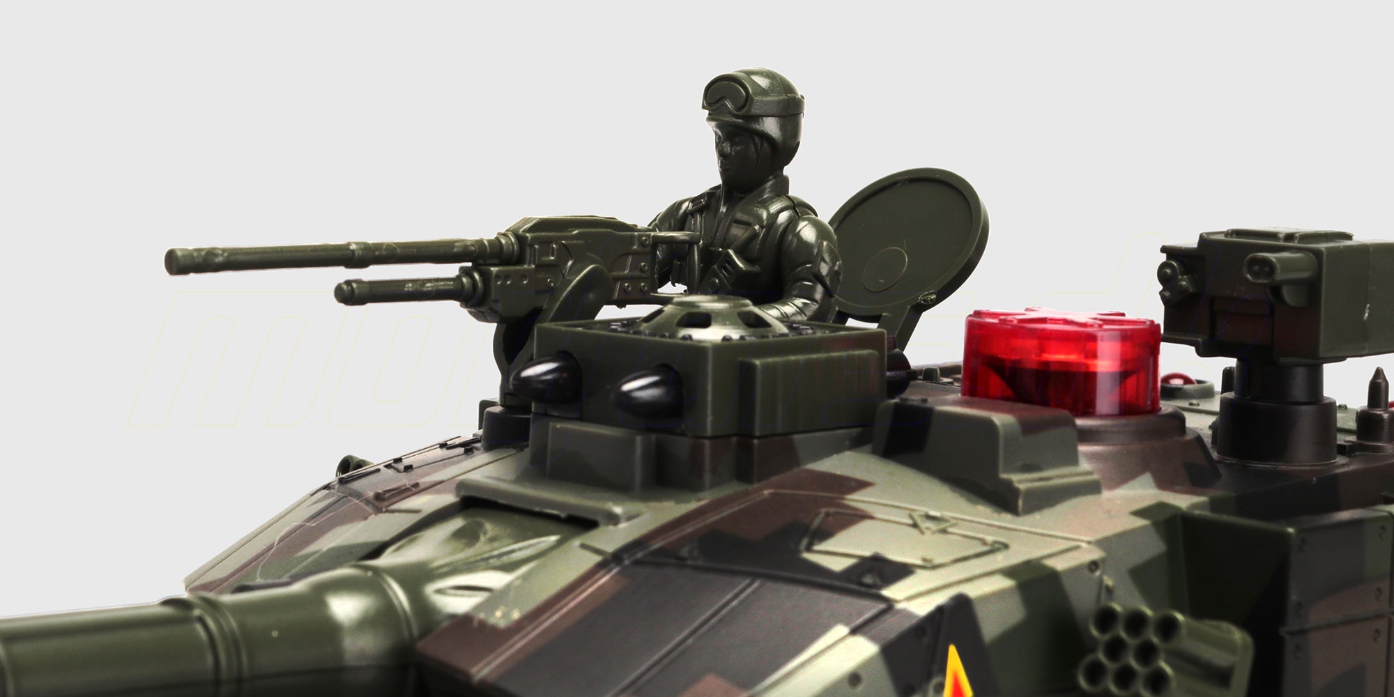 Nærbillede af en realistisk kampvognsfører figur placeret i tårnet på en fjernstyret Battle Tank.