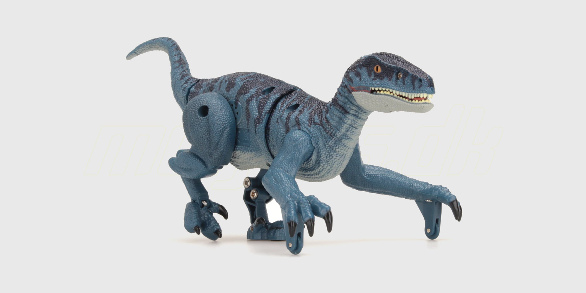 Blå lille dinosaurus figur i blødt materiale til leg og samling.