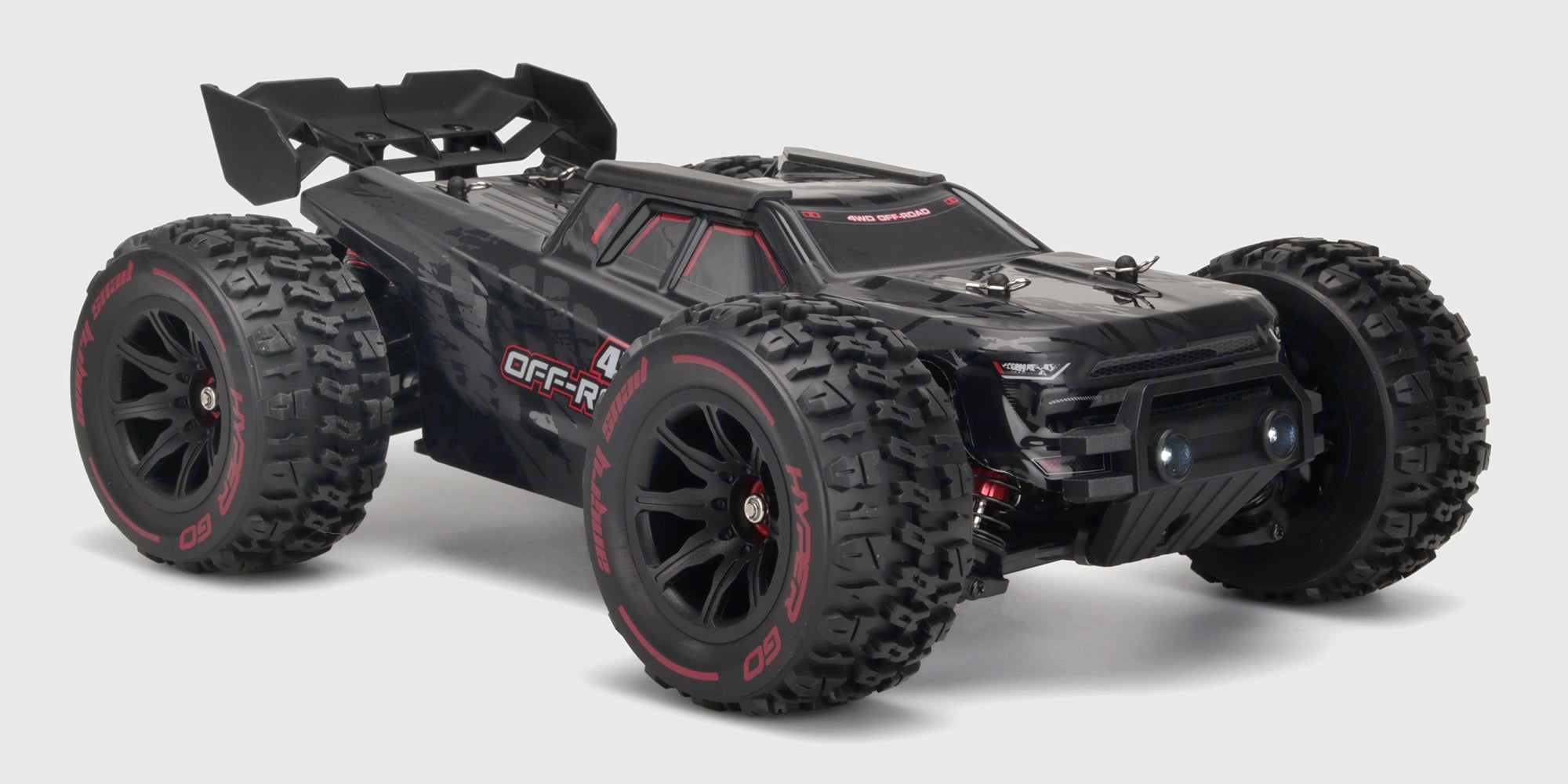 HyperGo EXtreme fjernstyret offroad truggy i rød og sort med kraftig affjedring og grove dæk.