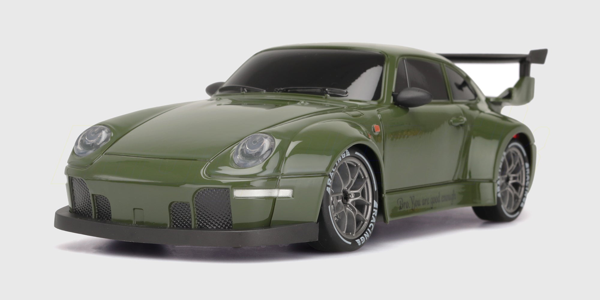 Sort BTD Drifter fjernstyret driftbil med aerodynamisk vinge og detaljeret karrosseri på hvid baggrund.