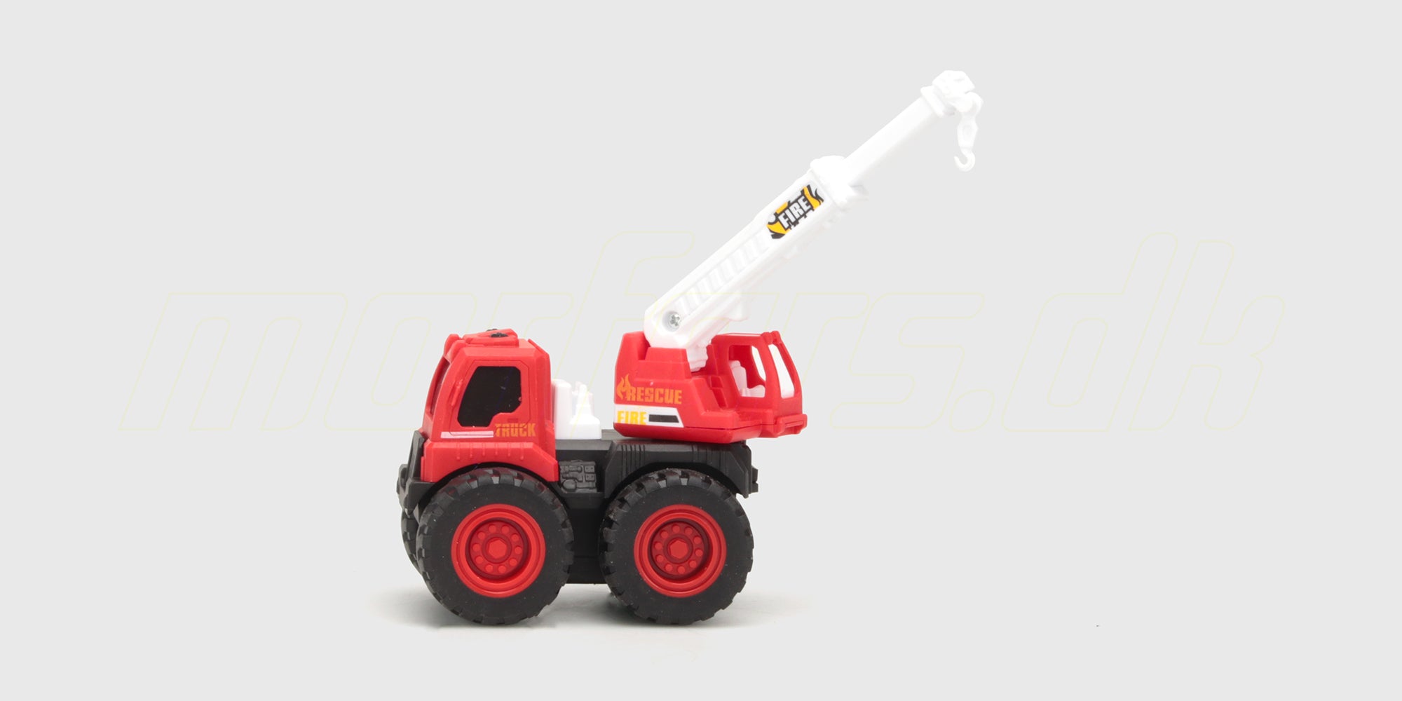 Gul Micro Monster friktionsbil med store terrængående dæk og robust affjedring til leg.