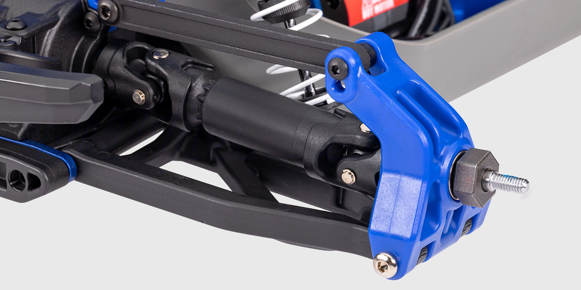 Blå Traxxas Rustler 4x4 BL-2S fjernstyret stadium truck med grove offroad-dæk klar til kørsel.