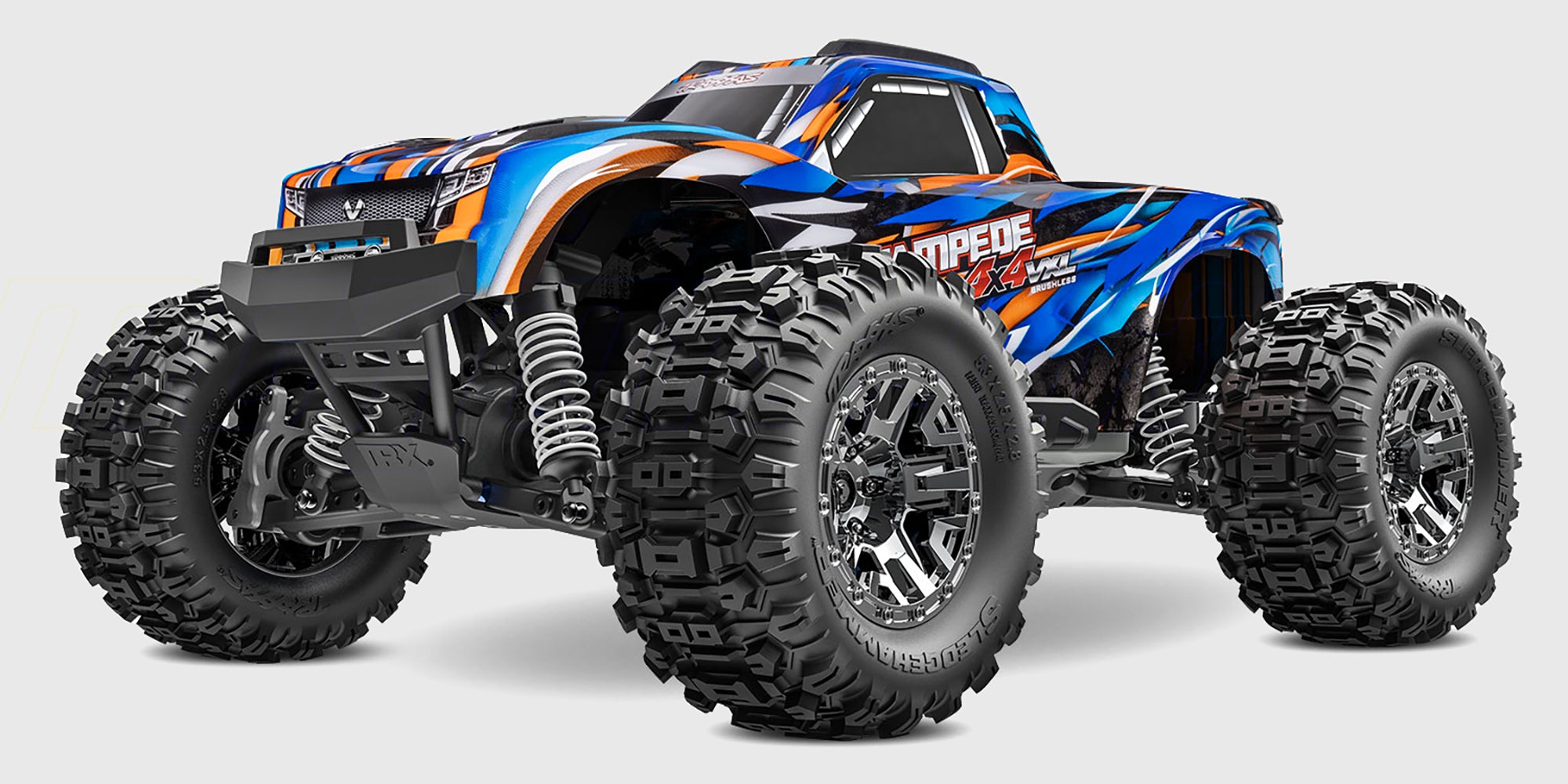 Traxxas Stampede 4x4 VXL fjernstyret monster truck i orange med store offroad dæk vist fra siden.