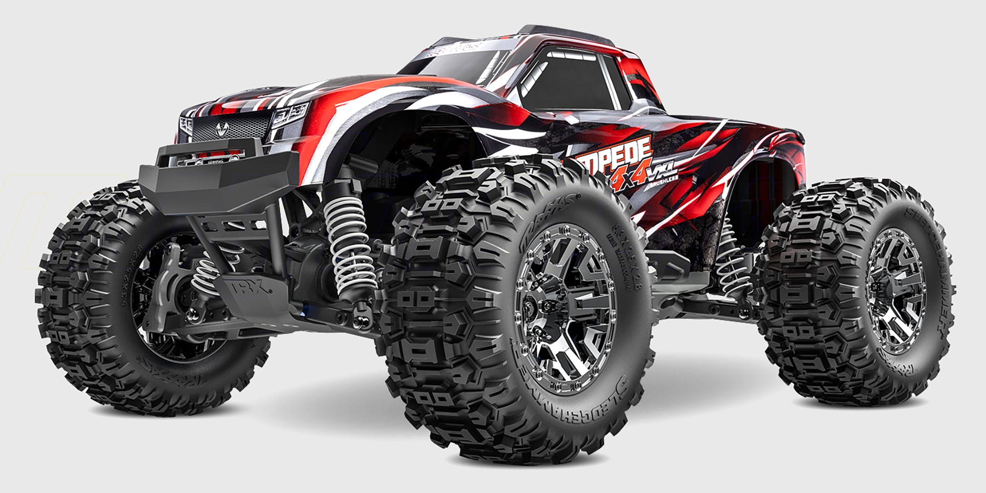 Blå Traxxas Stampede 4x4 VXL monster truck med store offroad dæk klar til kørsel i terræn.