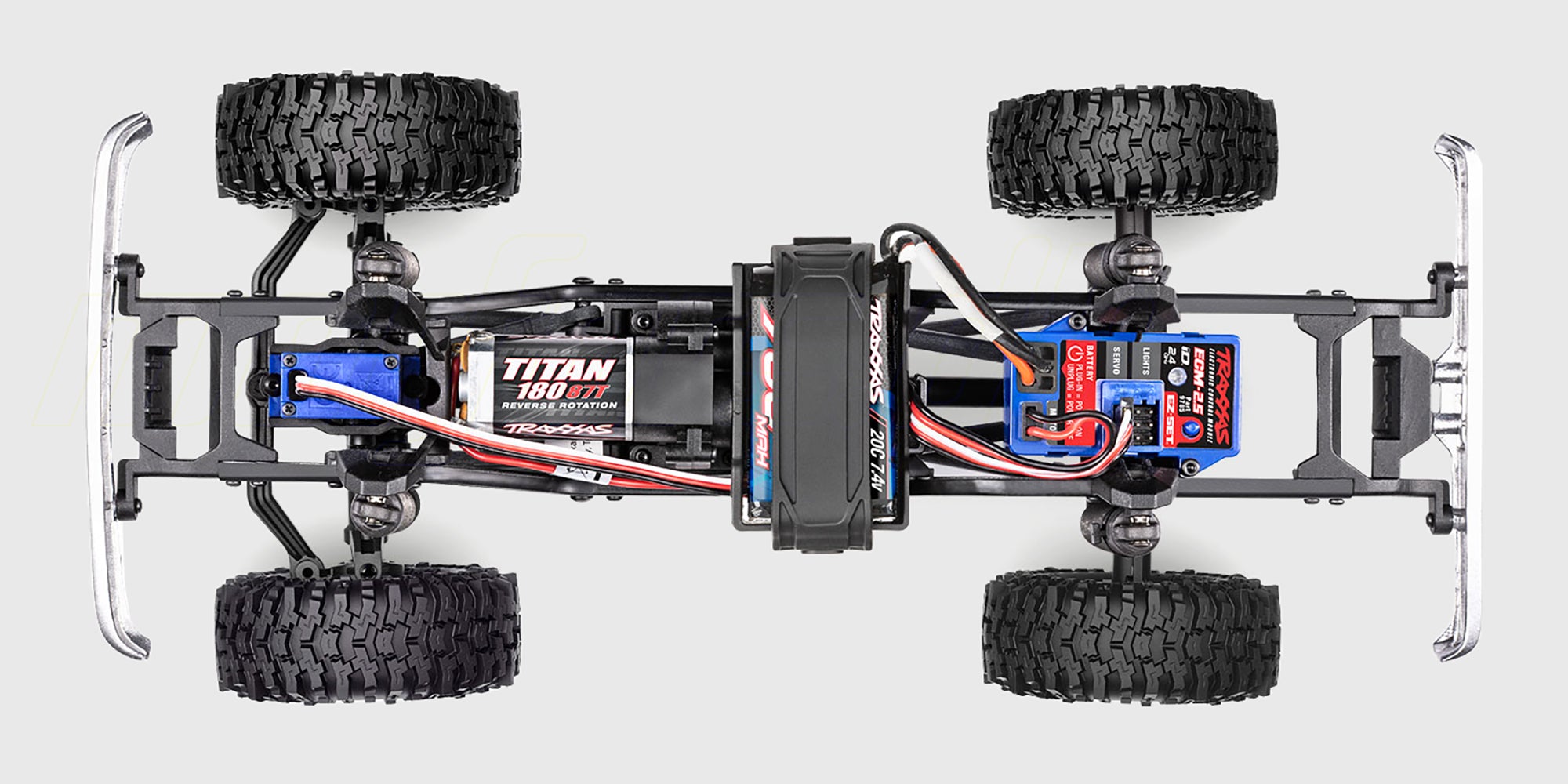 Rød Traxxas TRX-4M Chevrolet K10 fjernstyret crawler med High Trail-løft.