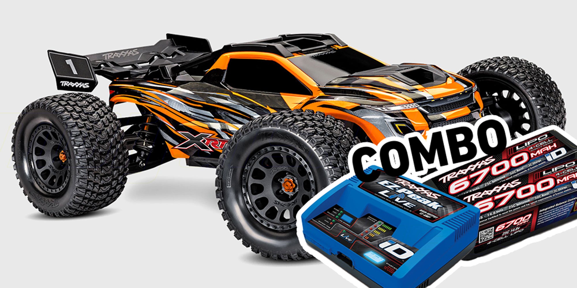 Traxxas XRT 8S race truck i rød og sort vist med fjernbetjening og batteripakke på hvid baggrund.