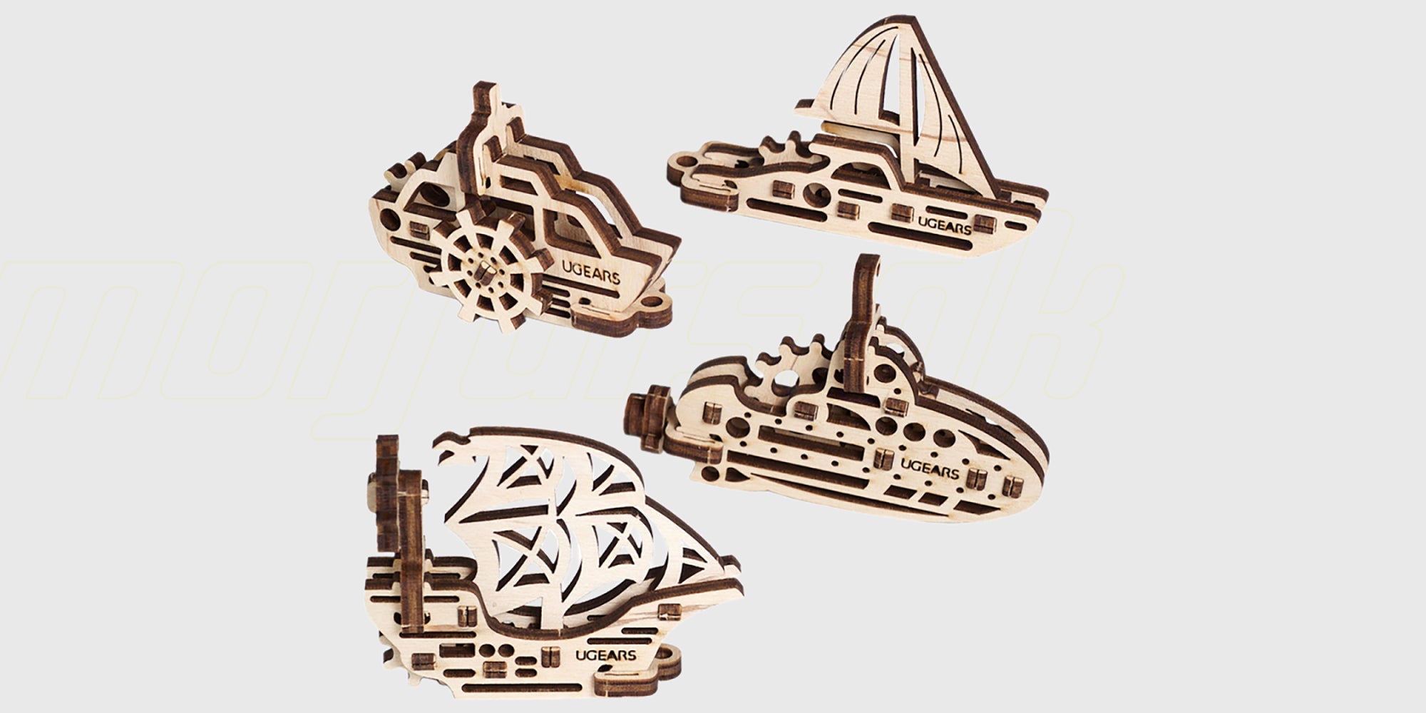 Mekanisk byggesæt til begyndere med tandhjul og bevægelige dele i lyst træ.