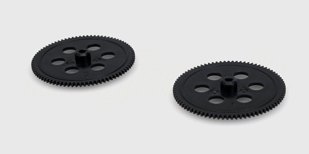 Hvidt FireFox Main Gear tandhjul i plast til fjernstyret helikopter set fra siden på hvid baggrund.