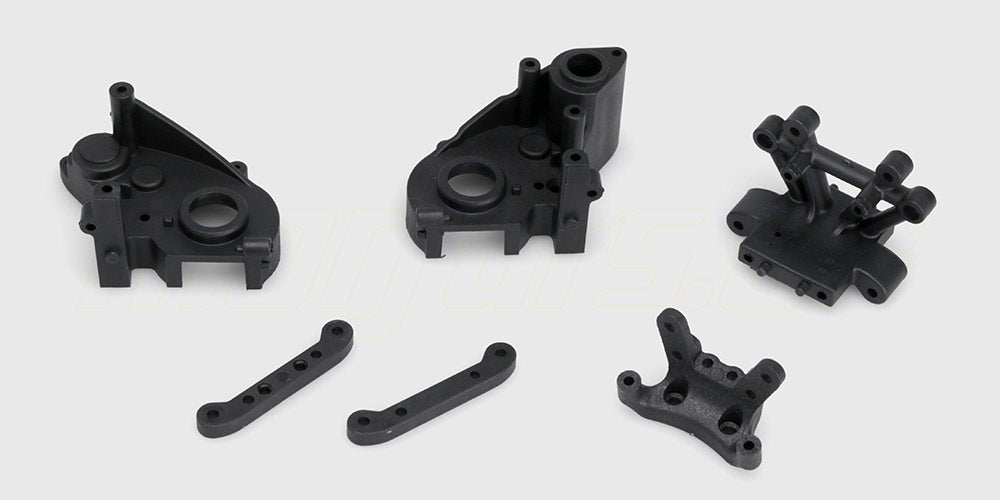 Sort Vortex gearkasse i robust plast til fjernstyret bil vist på en hvid baggrund.