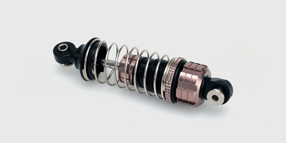 To blå Hurricane upgrade olie-støddæmpere i metal til optimering af affjedring på fjernstyrede biler.