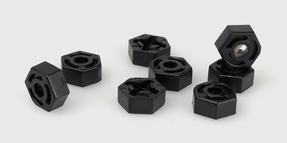 Sæt med to sorte hjulhex i plast til montering af hjul på en fjernstyret bil.