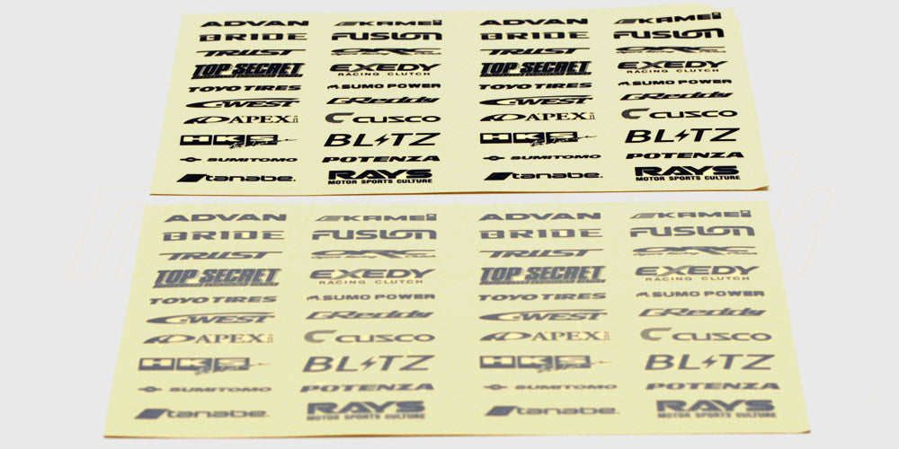 Ark med sorte og sølvfarvede Driftz logo-klistermærker til styling af fjernstyrede biler.