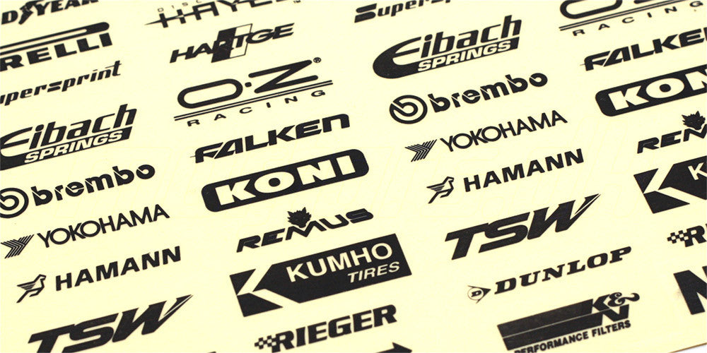 Ark med hvide Racez racer-klistermærker og sponsorlogoer til styling af fjernstyrede biler.