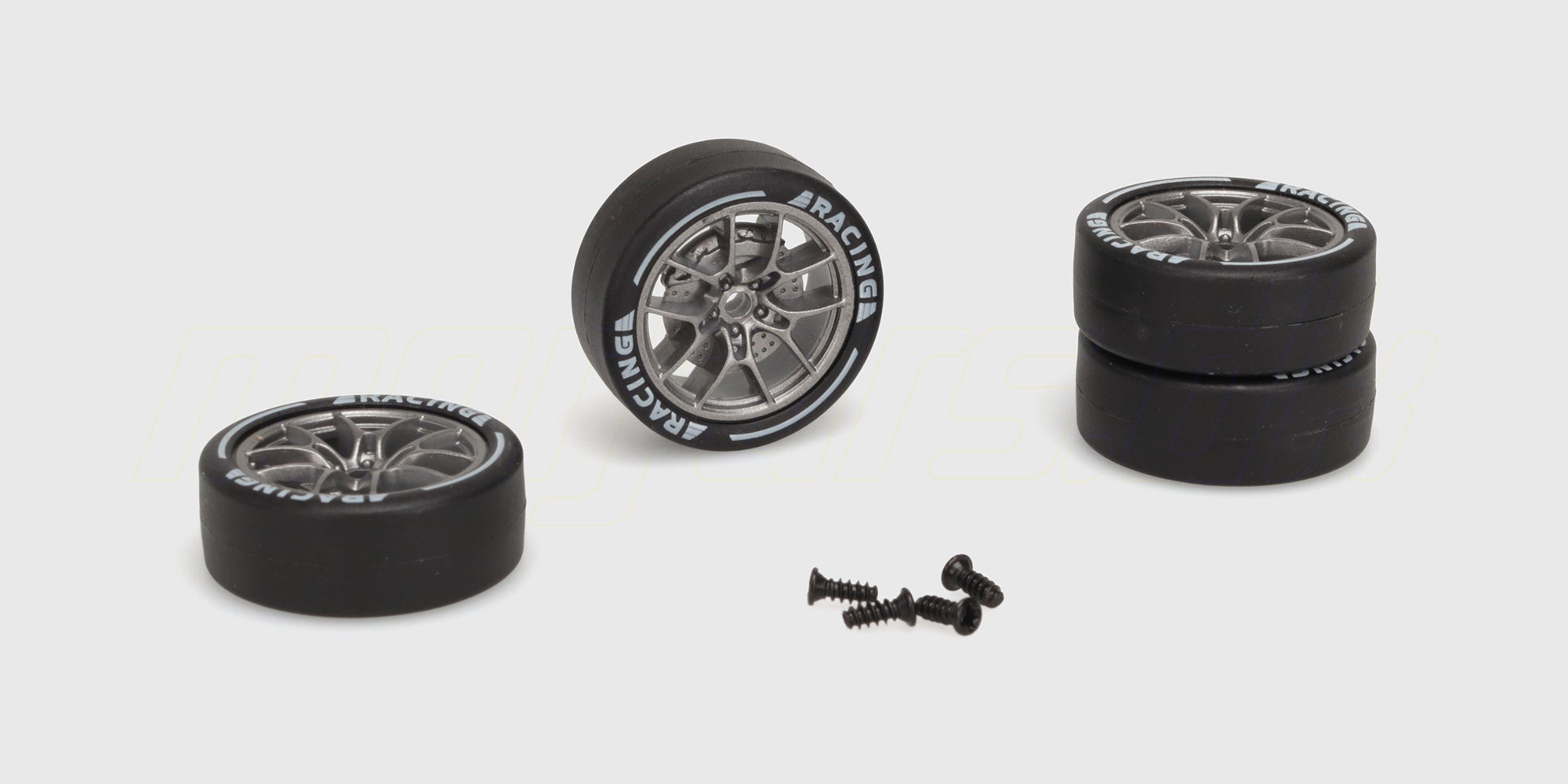 Hvide drifthjul med seks-egede fælge til BTD Drifter fjernstyret bil vist på en hvid baggrund.