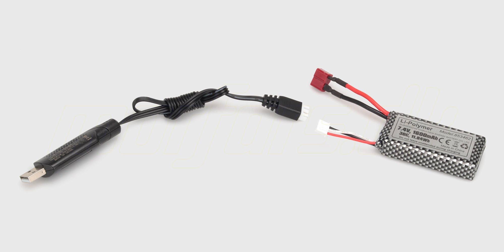 Grøn og sort HBX Tornado Brushless fjernstyret bil set skråt forfra på hvid baggrund.