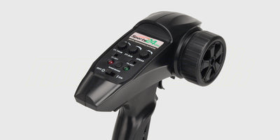 Sort fjernstyring til HBX Tornado Brushless med drejeknap til justering af bilens topfart.