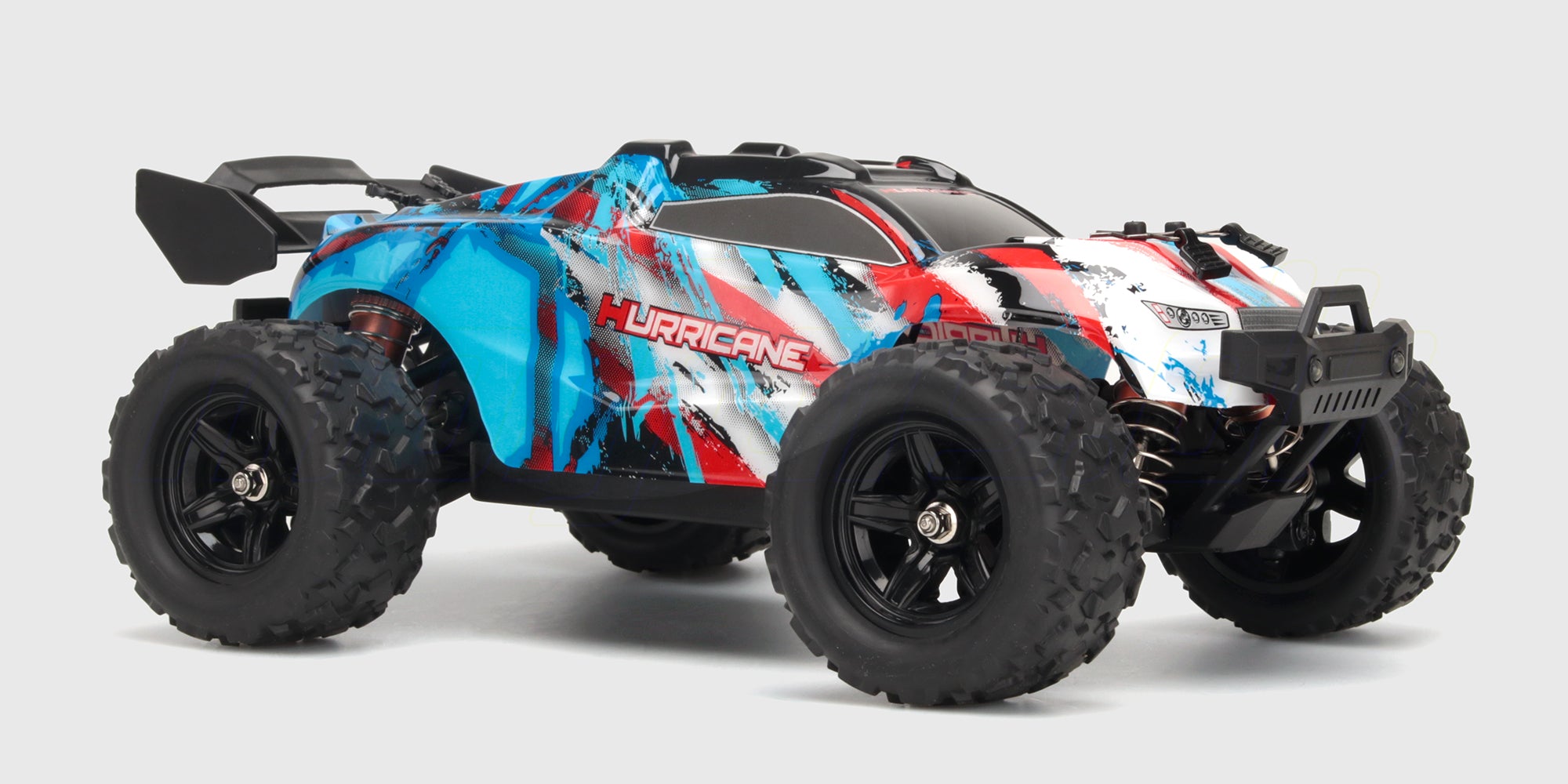 Blå Hurricane 2.0 fjernstyret offroad buggy med store dæk og robust affjedring til terrænkørsel.