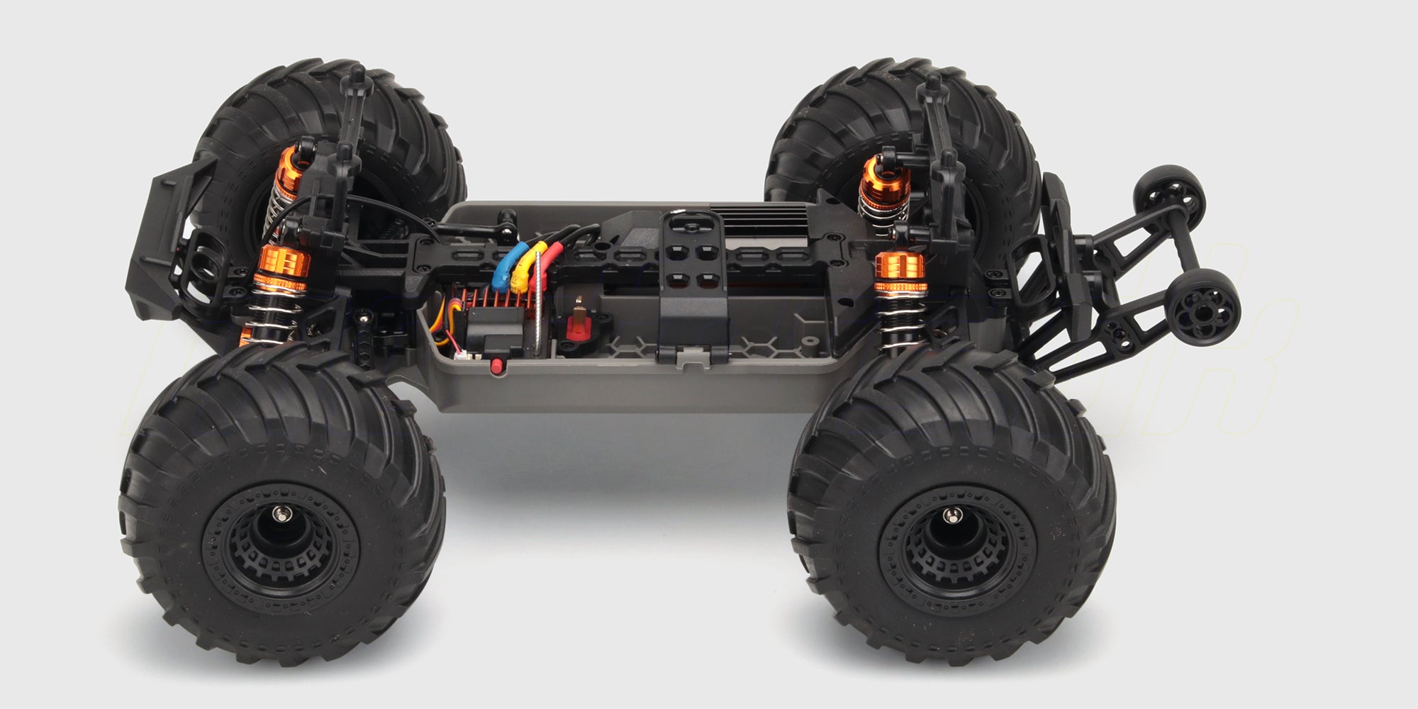 Hurricane XL Monster Truck Brushless med store terrængående dæk og robust blåt karrosseri set fra siden.