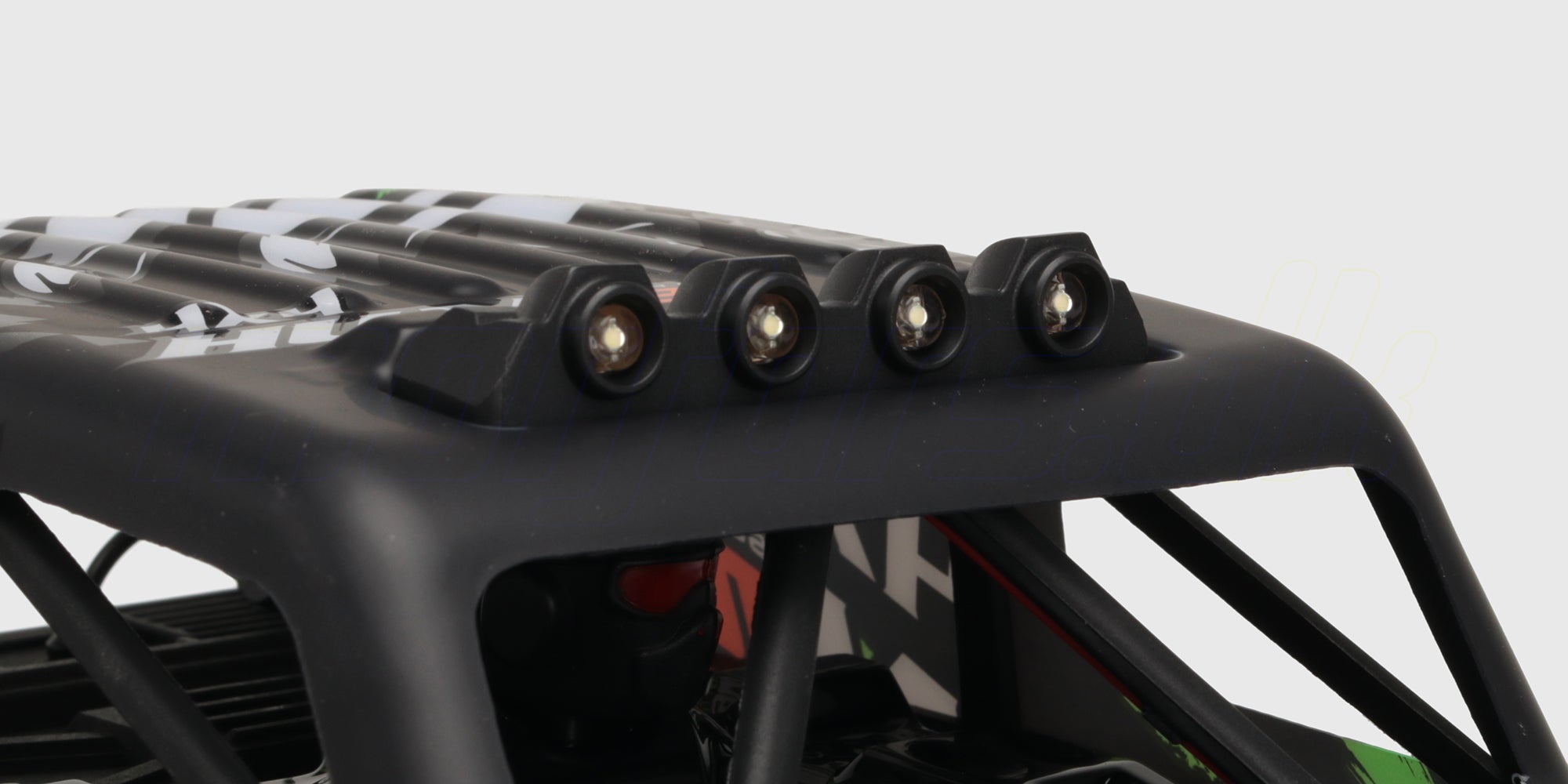 Nærbillede af den lysende LED-lysbjælke på taget af en Hurricane XL Monster Truck Brushless.