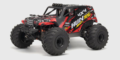 Rød Hurricane XL monster truck med store offroad-hjul og robust chassis set skråt forfra på hvid baggrund.
