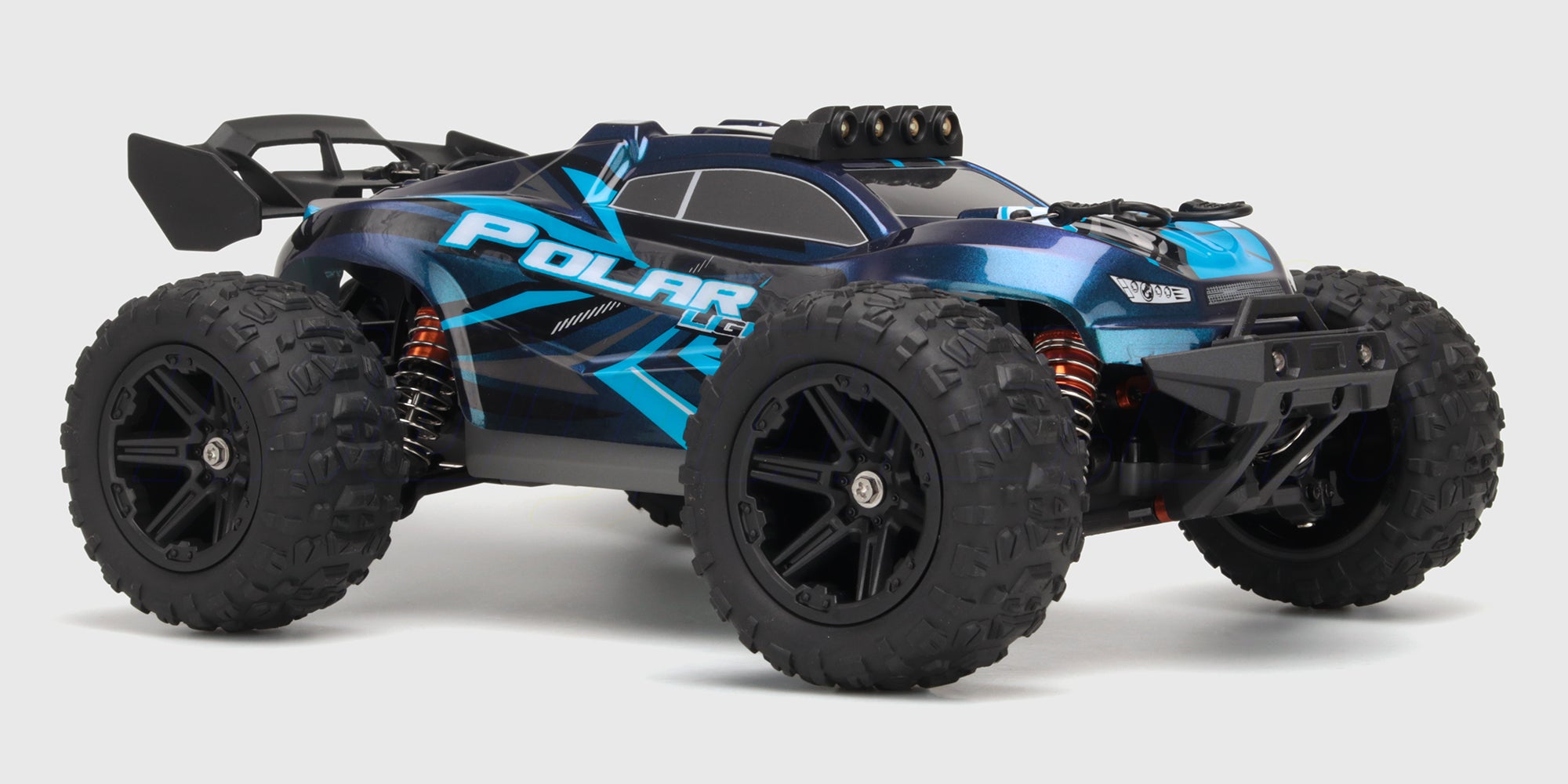 Hurricane XL fjernstyret monster truck i orange og sort med store offroad dæk og kraftig affjedring.