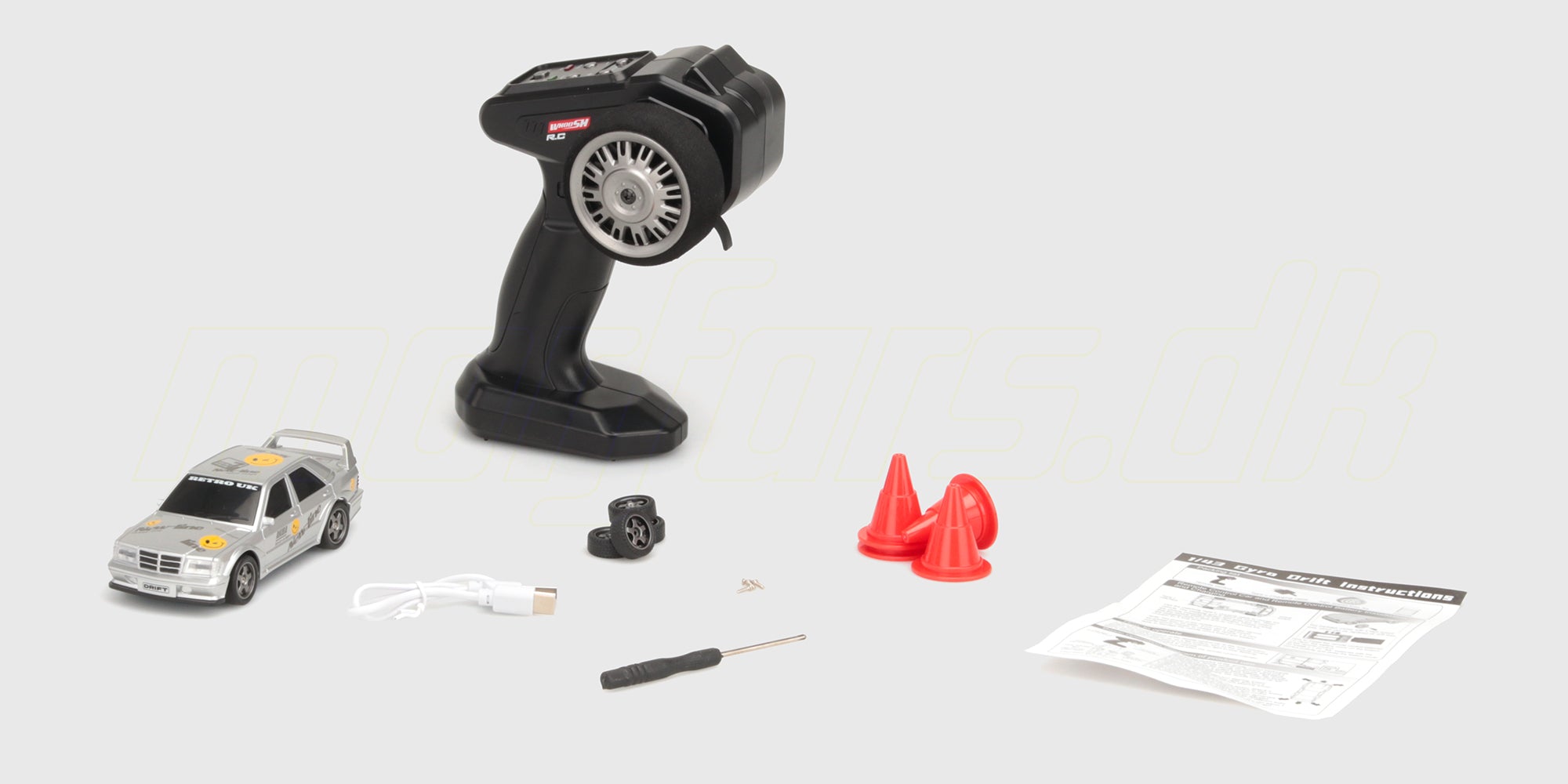 Orange Legend Drift fjernstyret bil i 1:16 skala der laver et kontrolleret drift på asfalt.