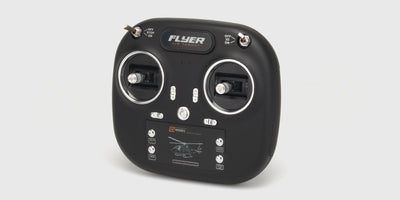 Sort fjernbetjening med to joysticks og kontrolknapper til styring af Top Hunter helikopteren.