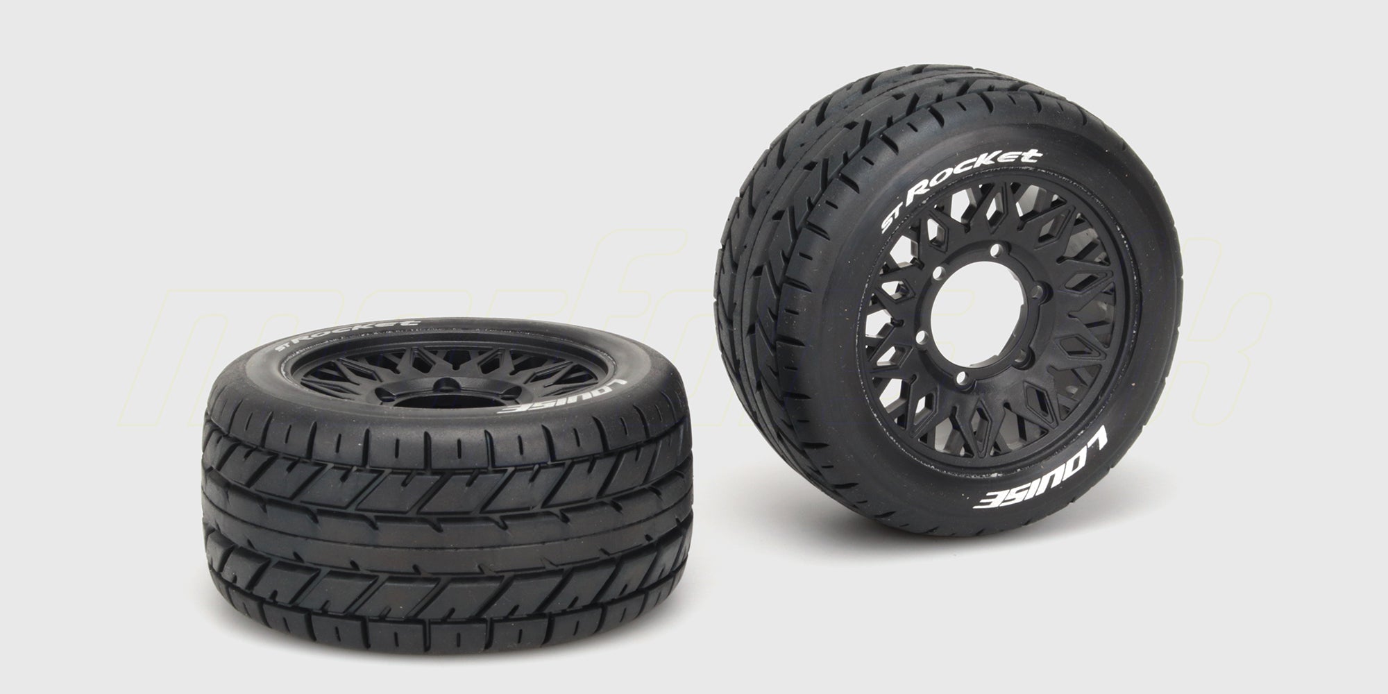 To sorte ST-Rocket dæk med hvide fælge til Stadium Truck fjernstyrede biler.