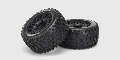To sorte ST-Uphill offroad hjul med groft dækmønster og hvide fælge til fjernstyrede biler.