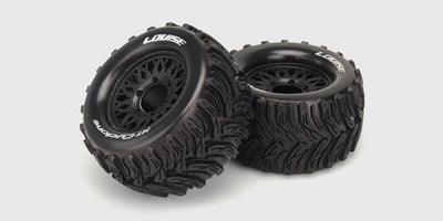 To sorte MT-Cyclone monster truck dæk med sølvfarvede fælge og groft offroad mønster til fjernstyret bil.