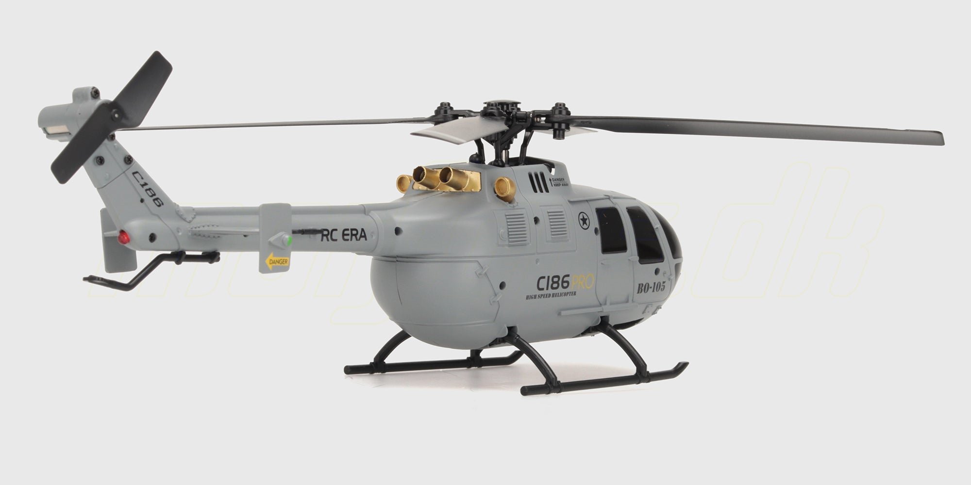 Grå C186 helikopter i realistisk militært design med fire rotorblade vist fra siden på hvid baggrund.