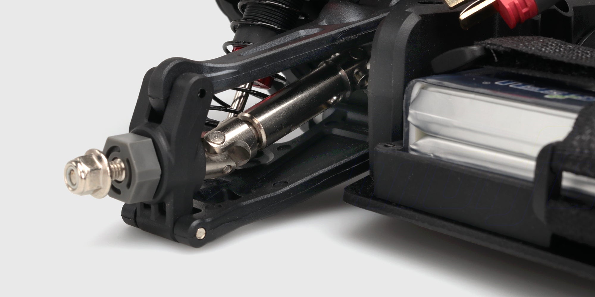 Hvid MJX HyperGo EXtreme monster truck med store offroad-hjul vist skråt forfra på hvid baggrund.