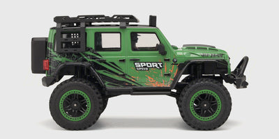 Wild Beast Mini Crawler fjernstyret bil i gul med store terrængående dæk set fra siden på hvid baggrund.