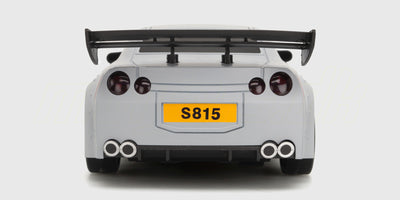 Sort BTD Drifter fjernstyret bil med hvidt karrosseri og spoilervinge på en hvid baggrund.