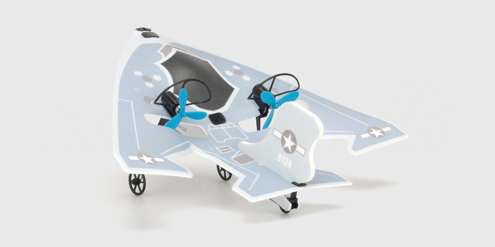 Hvid Mini Glider kastefly i skum til børn set fra siden mod en hvid baggrund.