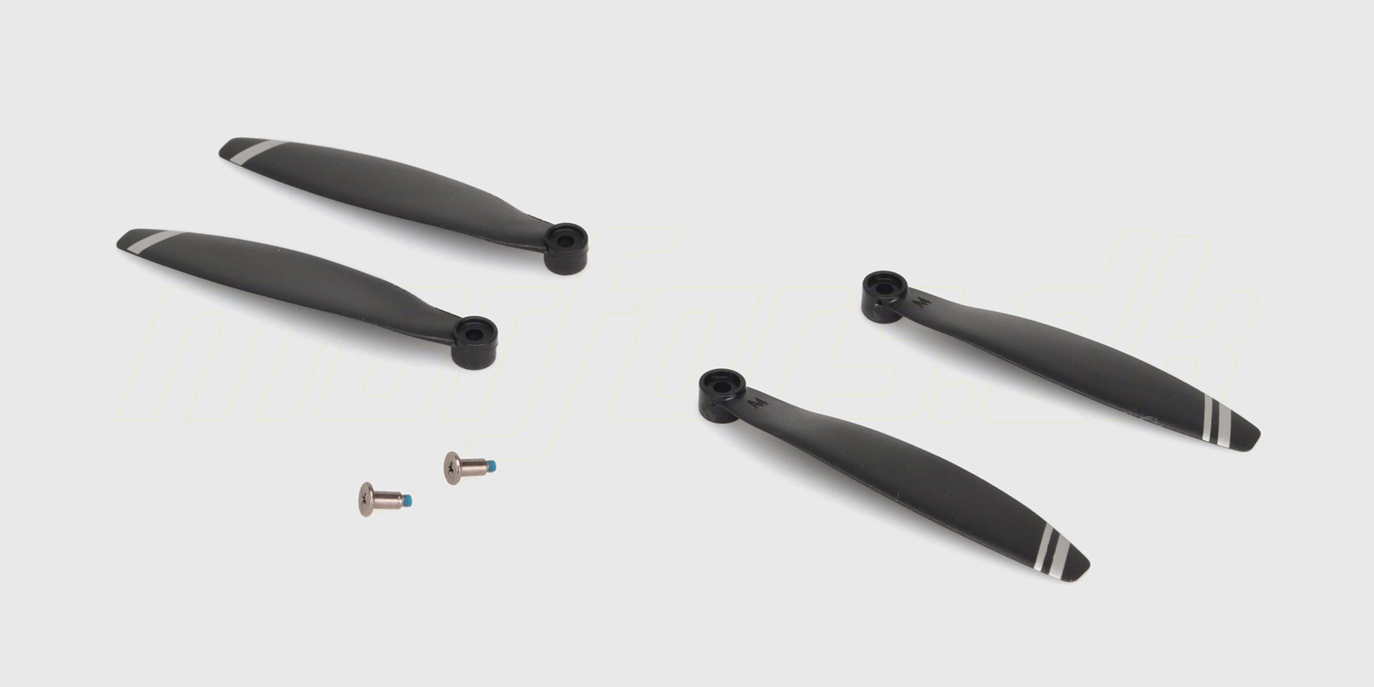 To sorte propeller til ST16B drone vist på en hvid baggrund som reservedele.