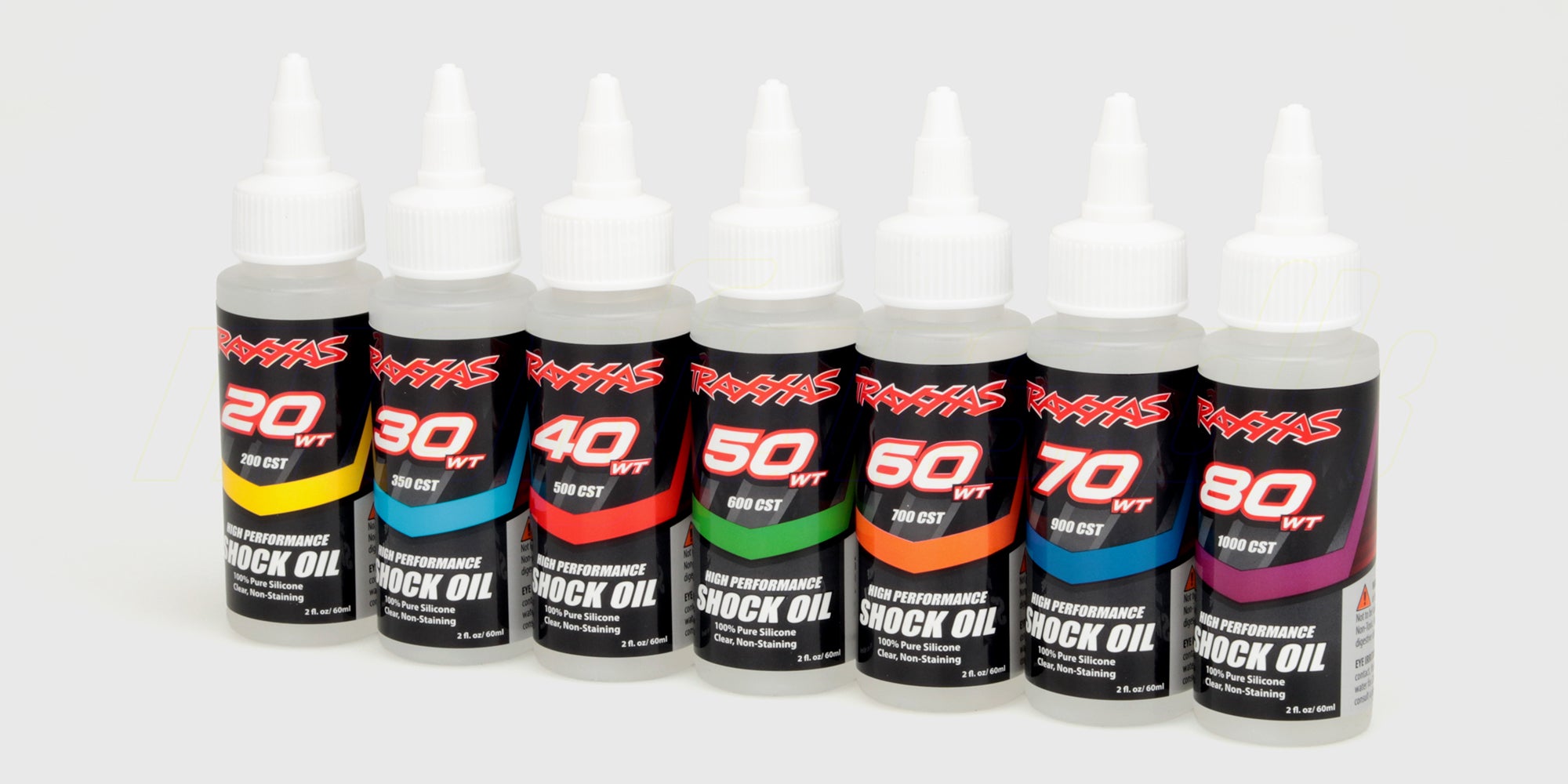 Flaske med silikoneolie til vedligeholdelse af støddæmpere og differentialer på fjernstyrede biler.