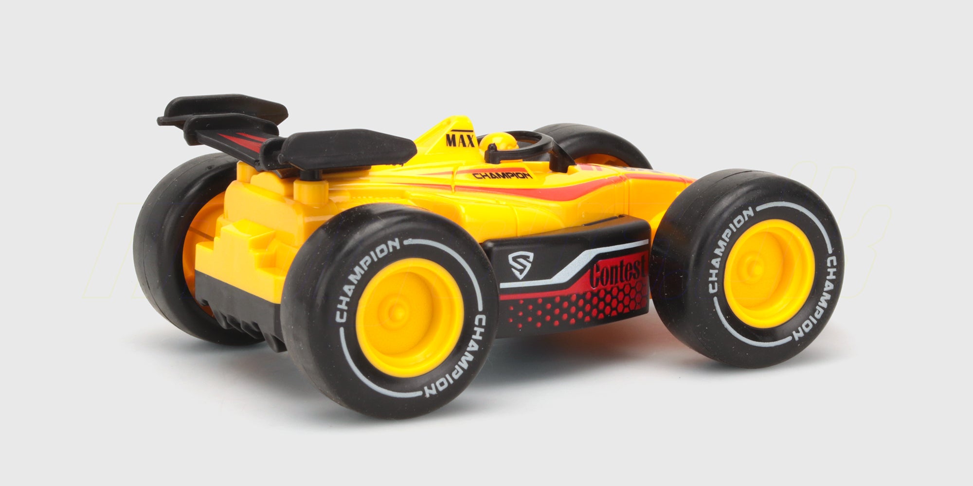 Grøn Super Racer friktionsbil til børn set fra siden på hvid baggrund.