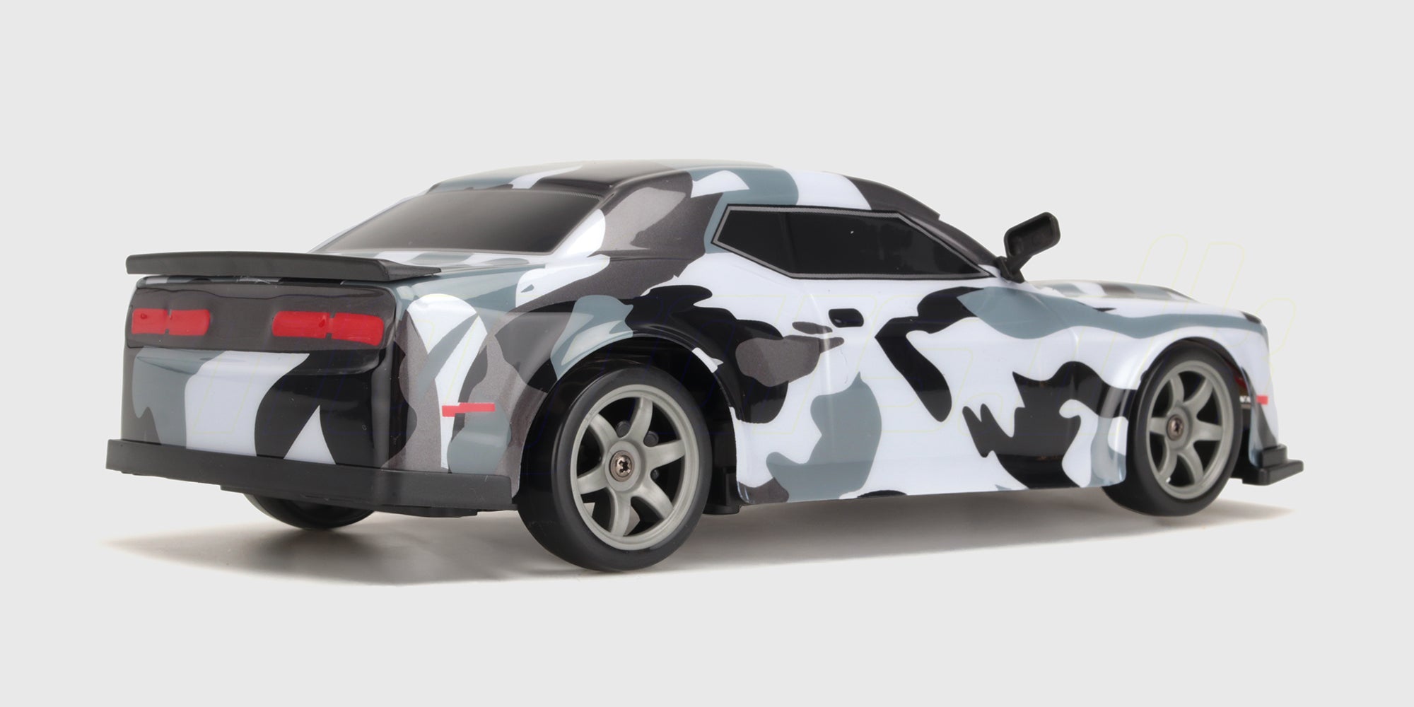 Super Drifter 4WD fjernstyret bil med detaljeret karrosseri og driftdæk vist på hvid baggrund.