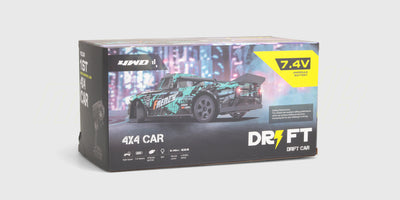 Super Drifter fjernstyret 4WD driftbil med blåt karrosseri og glatte dæk til præcis drifting.